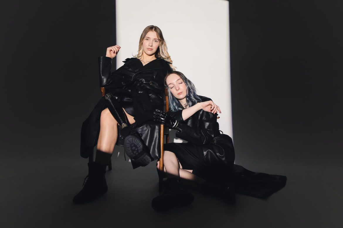 Photo Of Woman Leaning On Wooden Chair